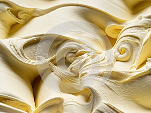 Vanila flavour gelato - full frame detail. Close up of a beige surface texture of vanilla Ice cream photo