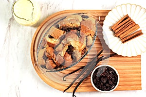 Vanilla Bread and Butter Pudding with Raisins in Clear Baking Dish