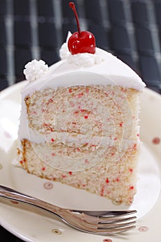 Vanilla cherry cake piece