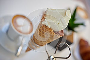 Vanilla and chocolate mixed Ice cream waffle sugar cones in metal holder