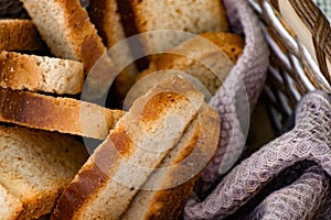 Vanilla crackers for tea, simple sweet crunchy snack in a wicker basket on natural fabric