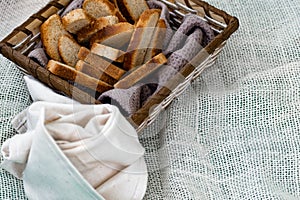 Vanilla crackers for tea, simple sweet crunchy snack in a wicker basket on natural fabric