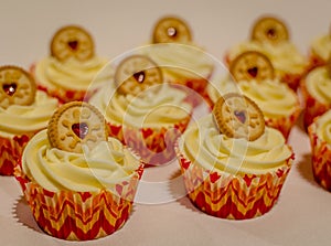 Vanilla cream cupcakes with jammy biscuit