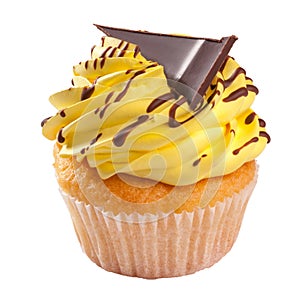 Vanilla cupcake with lemon whipped cream frosting and chocolate