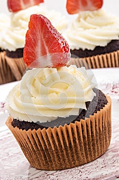 Vanilla cupcake with organic strawberry