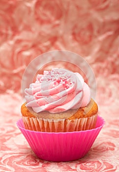 Vanilla cupcake with strawberry icing