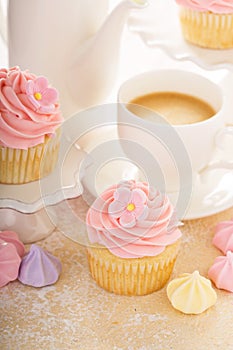 Vanilla cupcakes with pink raspberry frosting