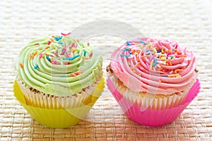 Vanilla cupcakes with strawberry and lime icing