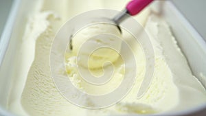 Vanilla ice cream being scooped