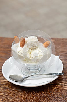 Vanilla ice cream with coconut, almonds and Raffaello photo