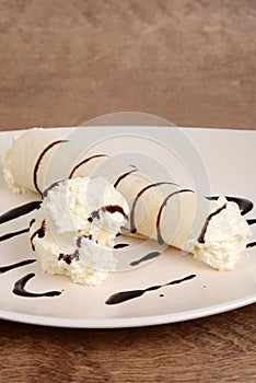 Vanilla ice cream crepe with chocolate sauce