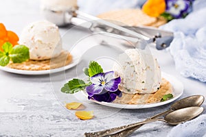 Vanilla ice cream with edible flowers