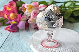 Vanilla ice cream with fozen berries photo