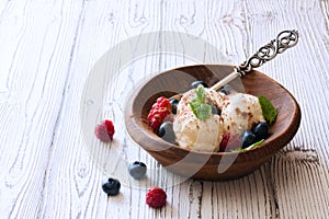 Vanilla ice cream with fresh berries