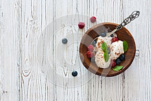 Vanilla ice cream with fresh berries