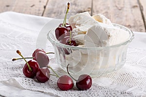 Vanilla ice-cream and fresh sweet cherry