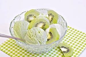 Vanilla ice cream and Kiwi ice cream with sliced Kiwi fruit