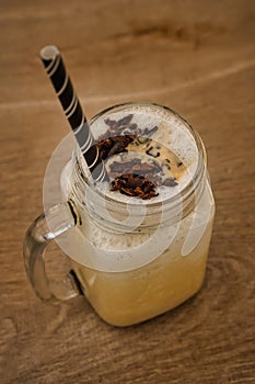 Vanilla ice cream milkshake drink in a glass jar