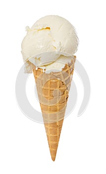 Vanilla ice cream in waffle cone isolated on white