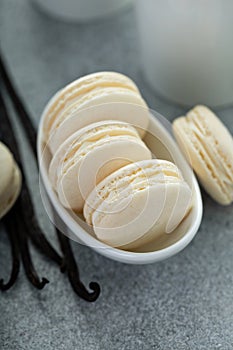 Vanilla macarons in a little bowl