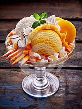 Vanilla and Peach Ice Cream Sundae with Fruit