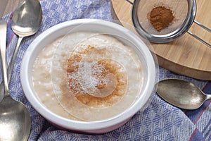 Vanilla rice pudding with cinnamon and sugar