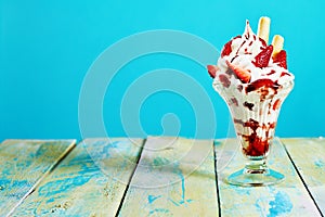 Vanilla and strawberry ice cream sundae