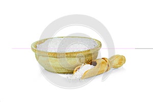 Vanilla sugar in a wooden cup with a spoon for spices isolated on a white background. Collection of spices and herbs