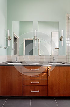 Vanity double sink and mirrors in modern bathroom