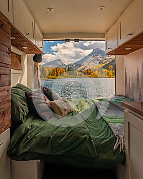 Vanlife Interior with Doors Open Beautiful Fall Scene