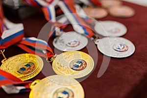 Vanquish the medals for the competition on table photo