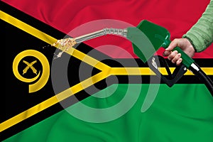 VANUATU flag Close-up shot on waving background texture with Fuel pump nozzle in hand. The concept of design solutions. 3d