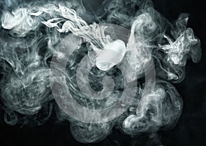 Vape ring like smoke ring on dark background