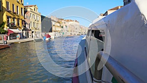 Vaporetto sailing on Grand Canal in Venice, view on houses, sightseeing