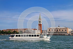 Vaporetto water bus going in front of Piazza San Marco in Venice, Italy