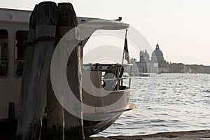 Vaporetto waterbus parked in a canal  close to a briccola  Venice