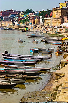 Varanasi, India - August 20, 2009: boats on the banks of the Ganges in Varanasi, Uttar Pradesh