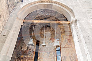 VARDZIA, GEORGIA - JULY 14, 2017: Church bells in the cave monastery Vardzia carved into a cliff, Georg