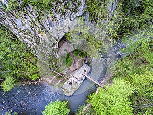 Varghisului Gorges in Covasna and Harghita county, Transylvania, Romania. Entrance to one of the caves visible. Aerial view from