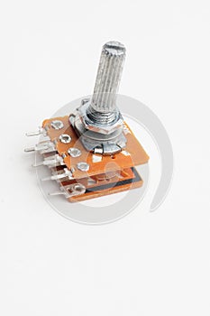 Variable resistor, potentiometer on white background