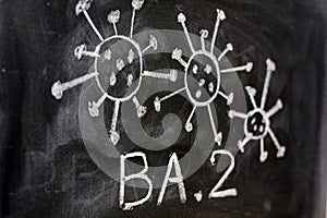 Variant of the coronavirus, omicron BA. 2, drawn on a blackboard with chalk