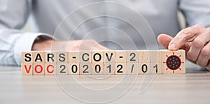 Variant of SARS-CoV-2: VOC-202012/01 on wooden cubes