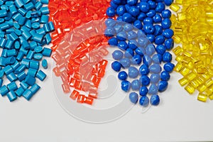 Colored plastic resins in laboratory photo