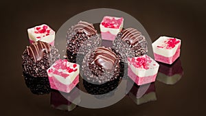 Variaton of chocolate pralines Assortment of dark white and milk chocolate Sweet and chocolates background