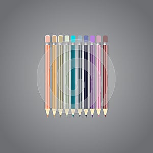 Varicolored color pencils set isolated on gray background. Office supplies.