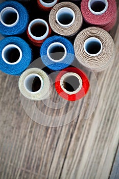 Varicolored spools of thread