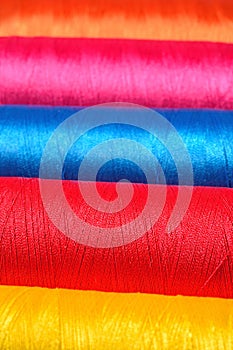 Varicolored spools thread macro