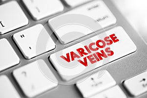Varicose Veins - swollen and enlarged veins that usually occur on the legs and feet, text concept button on keyboard