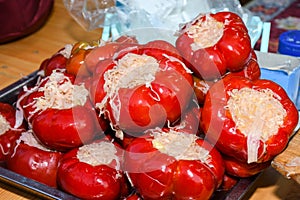 Varied assortment of pickles like red peppers stuffed with cabbage