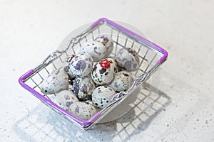 Variegated quail eggs with small brown specks